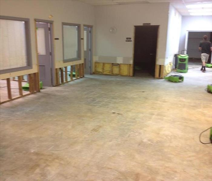 Empty office space after SERVPRO completed the demo of the strom damage - Let the drying begin