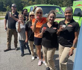 Crew posing during a snow cone break