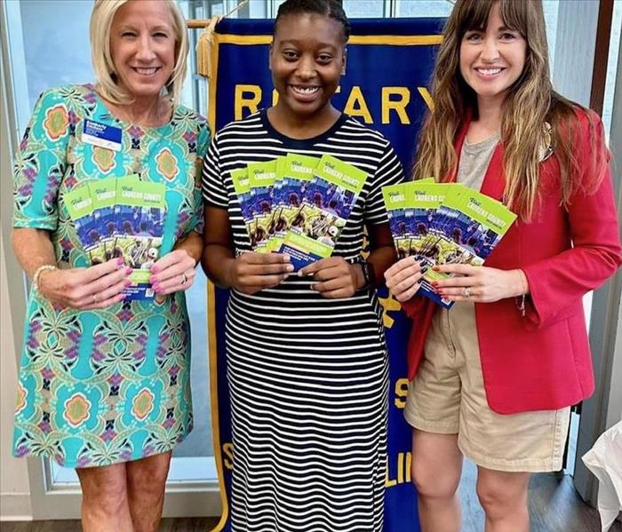 Owner  Kimberly Kitchens with the Laurens County Rotary Club