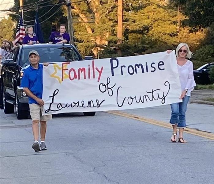 Kimberly Kitchens and her team of Family Promise leading the Laurens Homecoming Parade