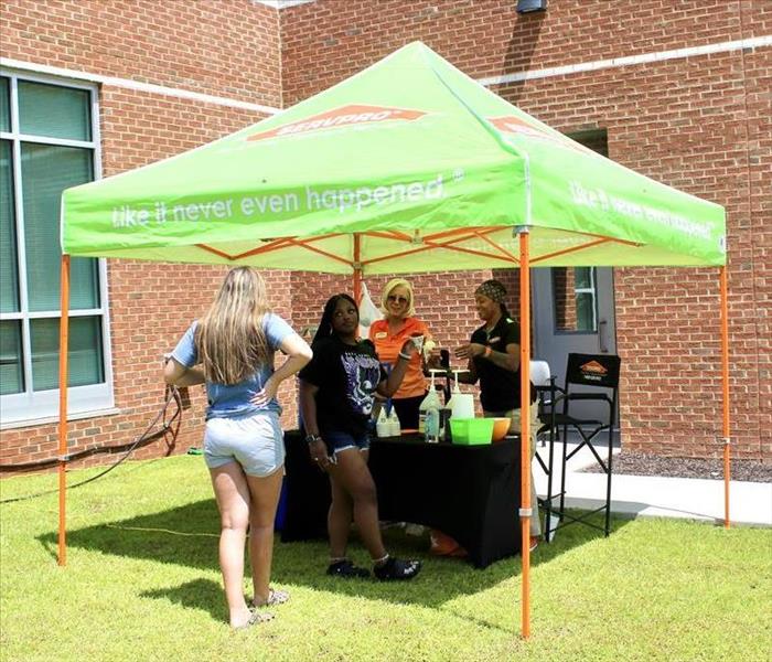 The SERVPRO® team serving up snow cones on Newberry College Campus