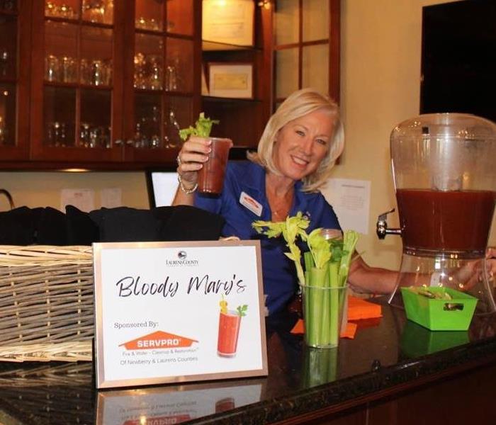 Owner Kimberly Kitchens serving up her famous Bloody Mary's at the Annual Chamber Golf Tournament