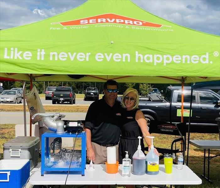 Owners Mel and KImberly Kitcehns ready to serve up some snow cones! 