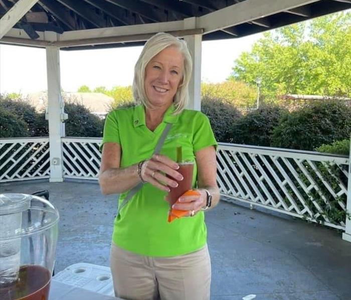 Owner Kimberly Kitchens serving up her delicious Bloody Marys to Golfers. 
